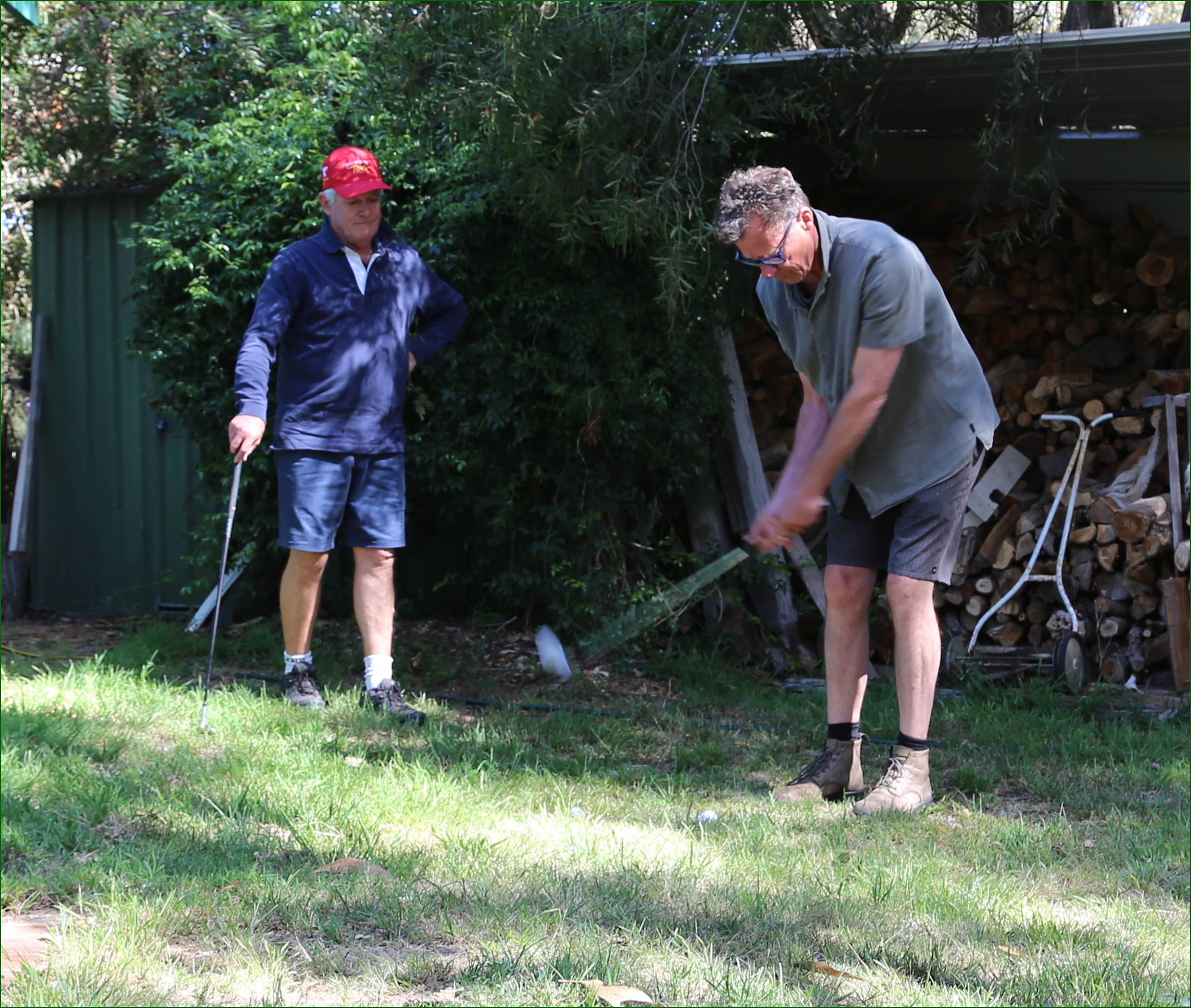 A group of men playing golf

Description automatically generated