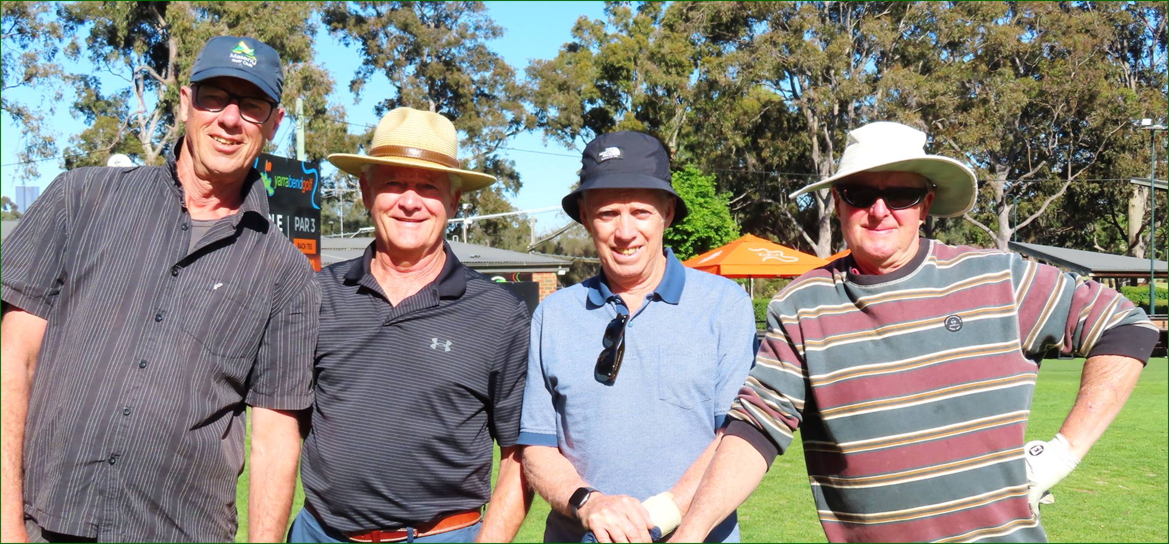 A group of men wearing hats

Description automatically generated