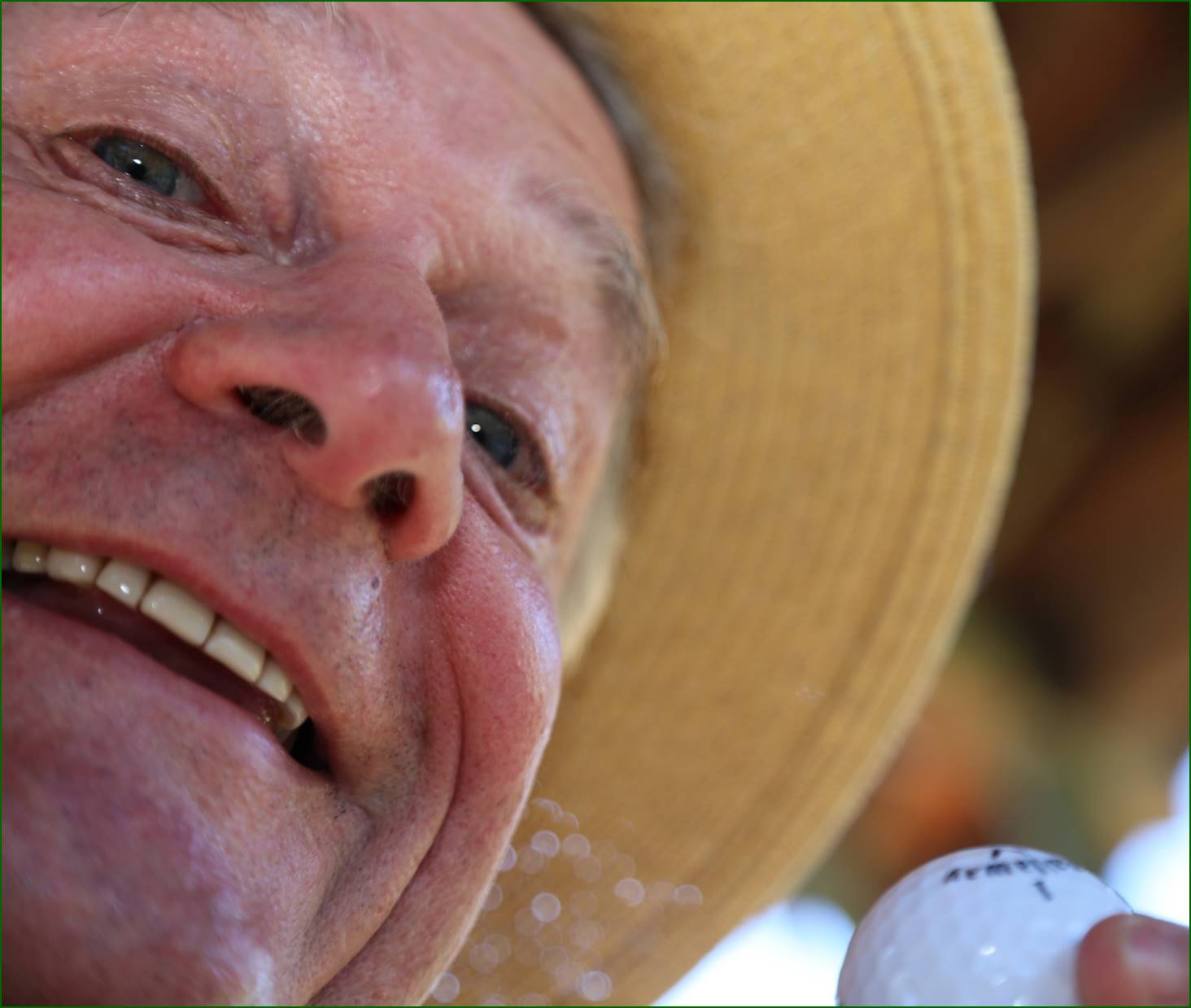 A close-up of a person smiling

Description automatically generated