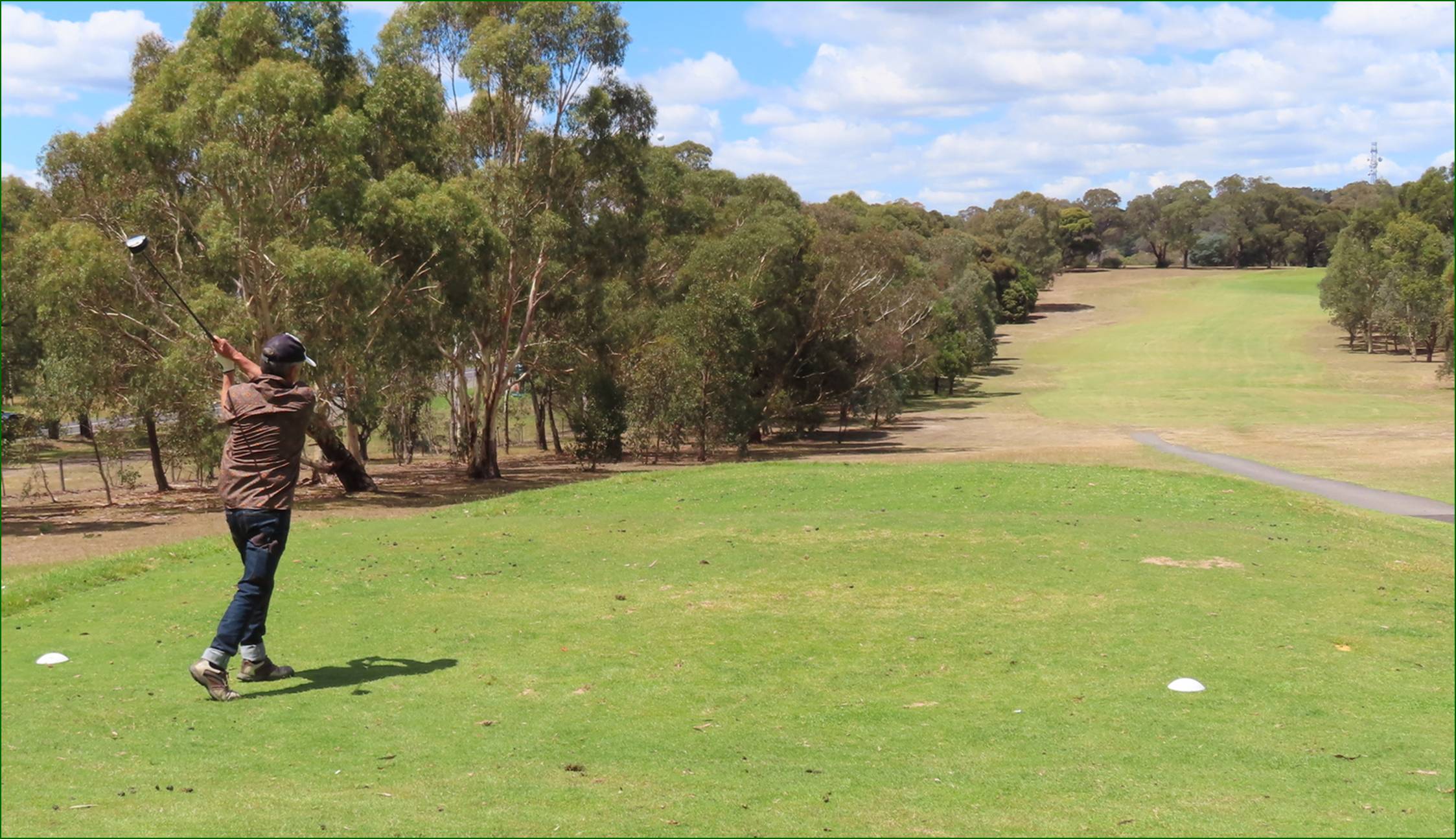 A person running on a green field

Description automatically generated