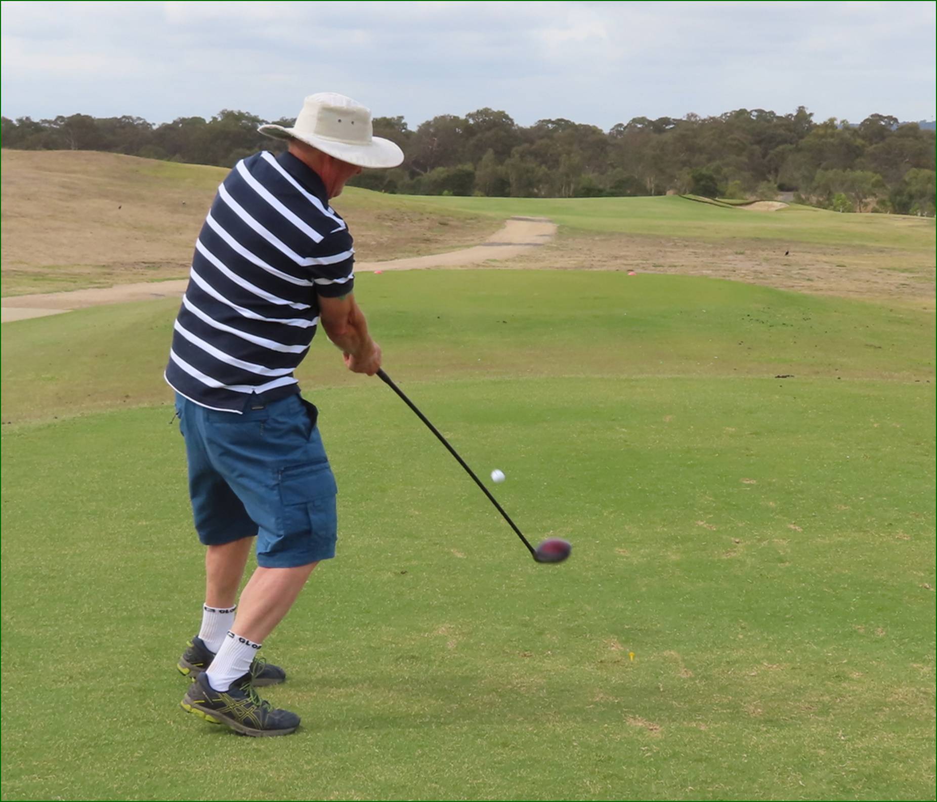 A person swinging a golf club

AI-generated content may be incorrect.