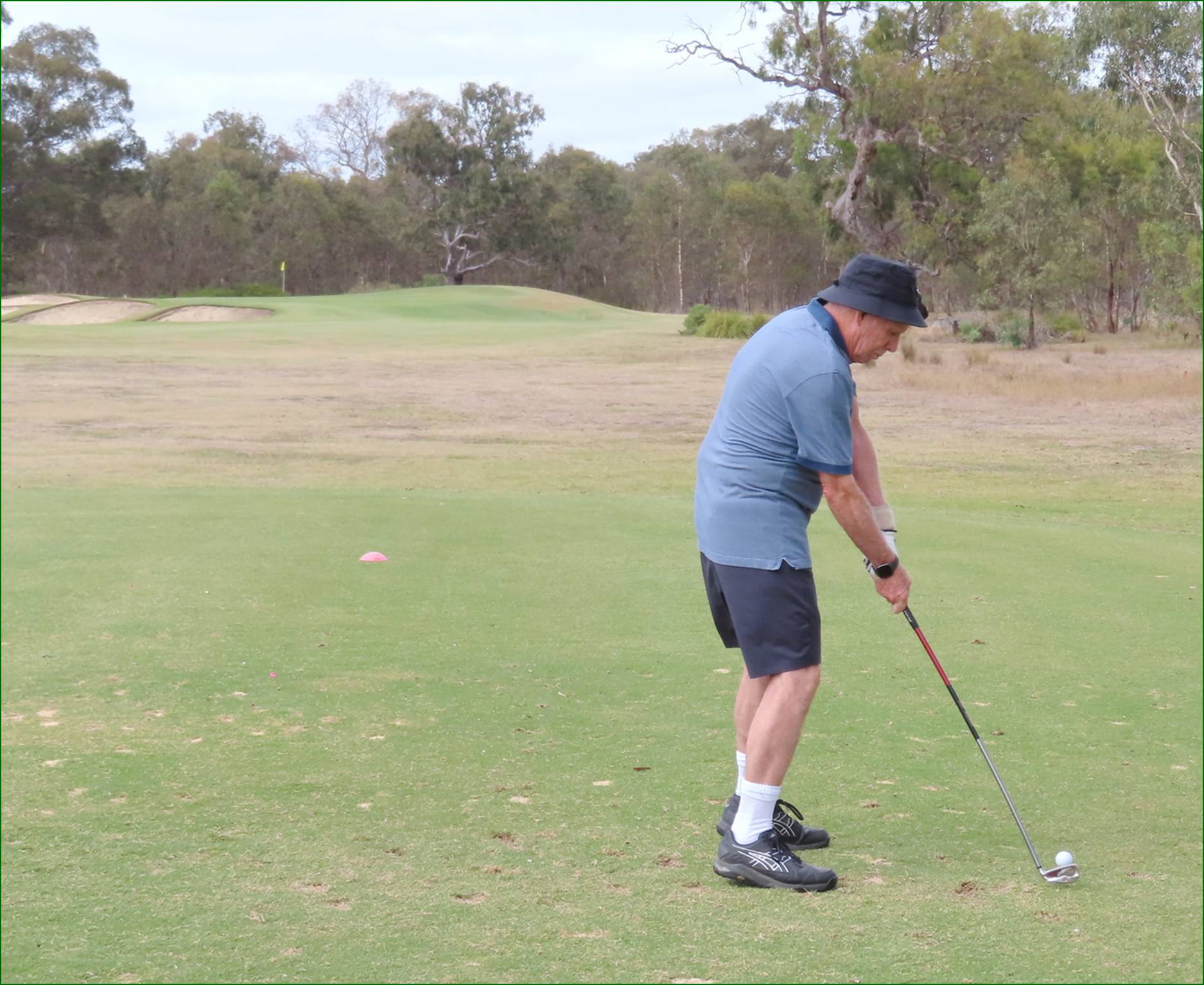 A person playing golf on a golf course

AI-generated content may be incorrect.