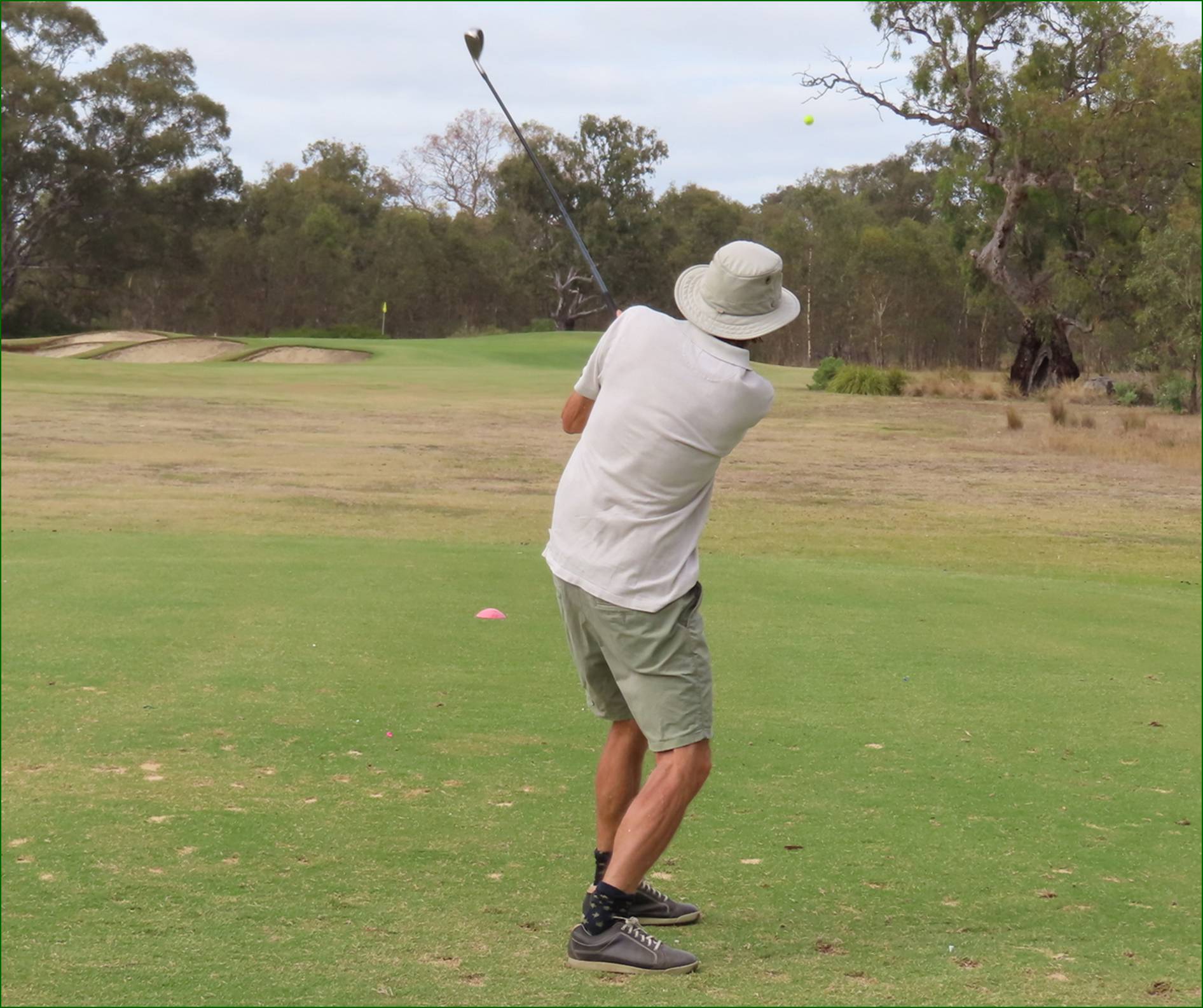 A person swinging a golf club

AI-generated content may be incorrect.