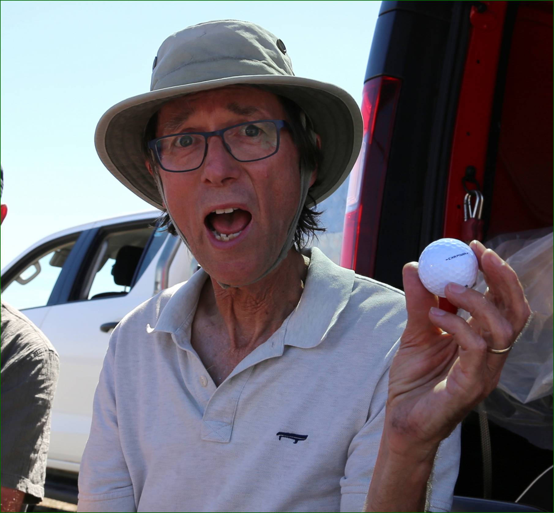 A person holding a golf ball

AI-generated content may be incorrect.