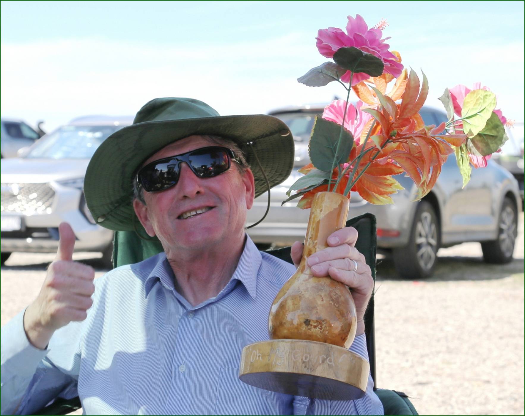A person in a wheelchair holding a vase with flowers

AI-generated content may be incorrect.