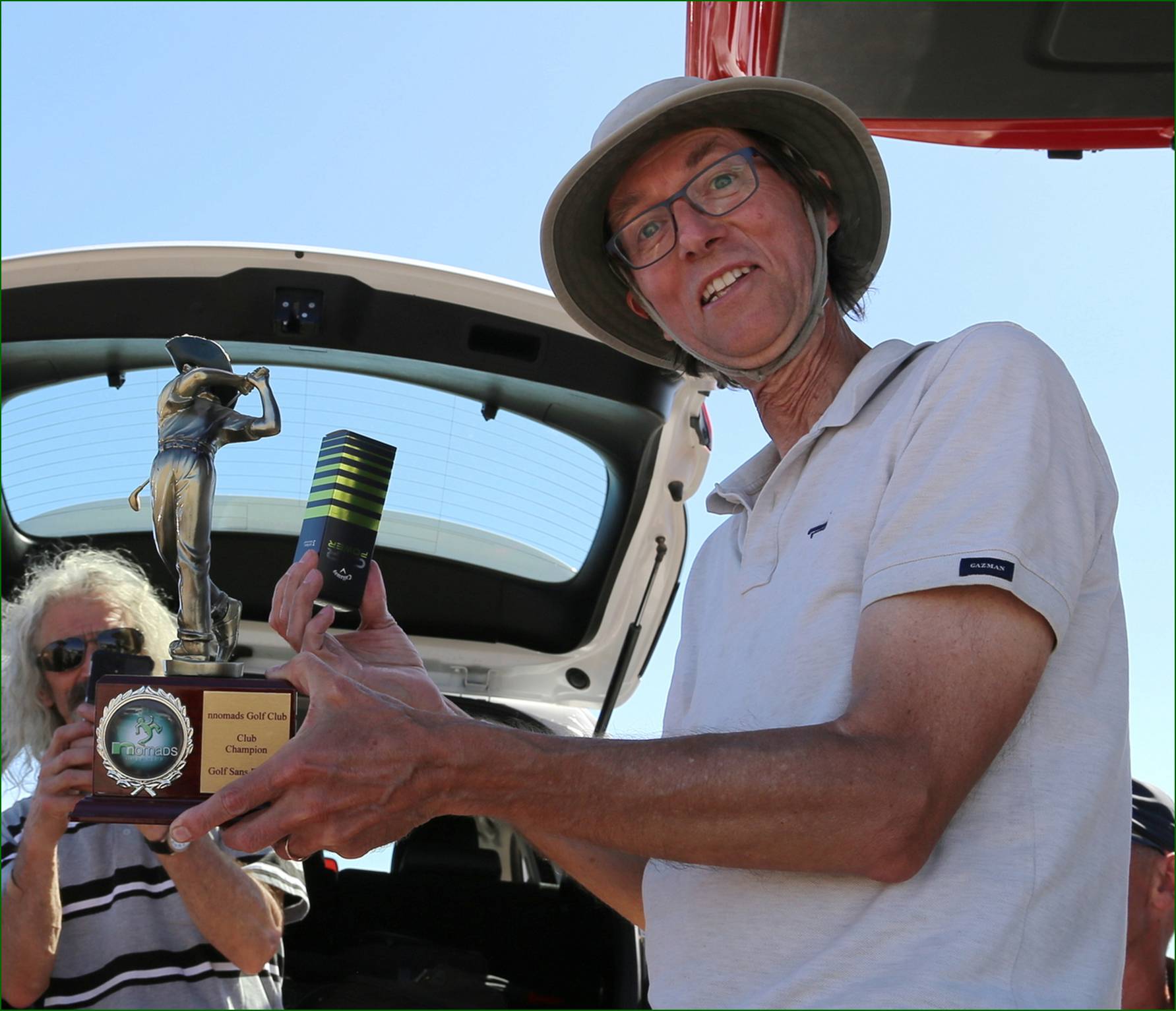 A person holding a trophy

AI-generated content may be incorrect.
